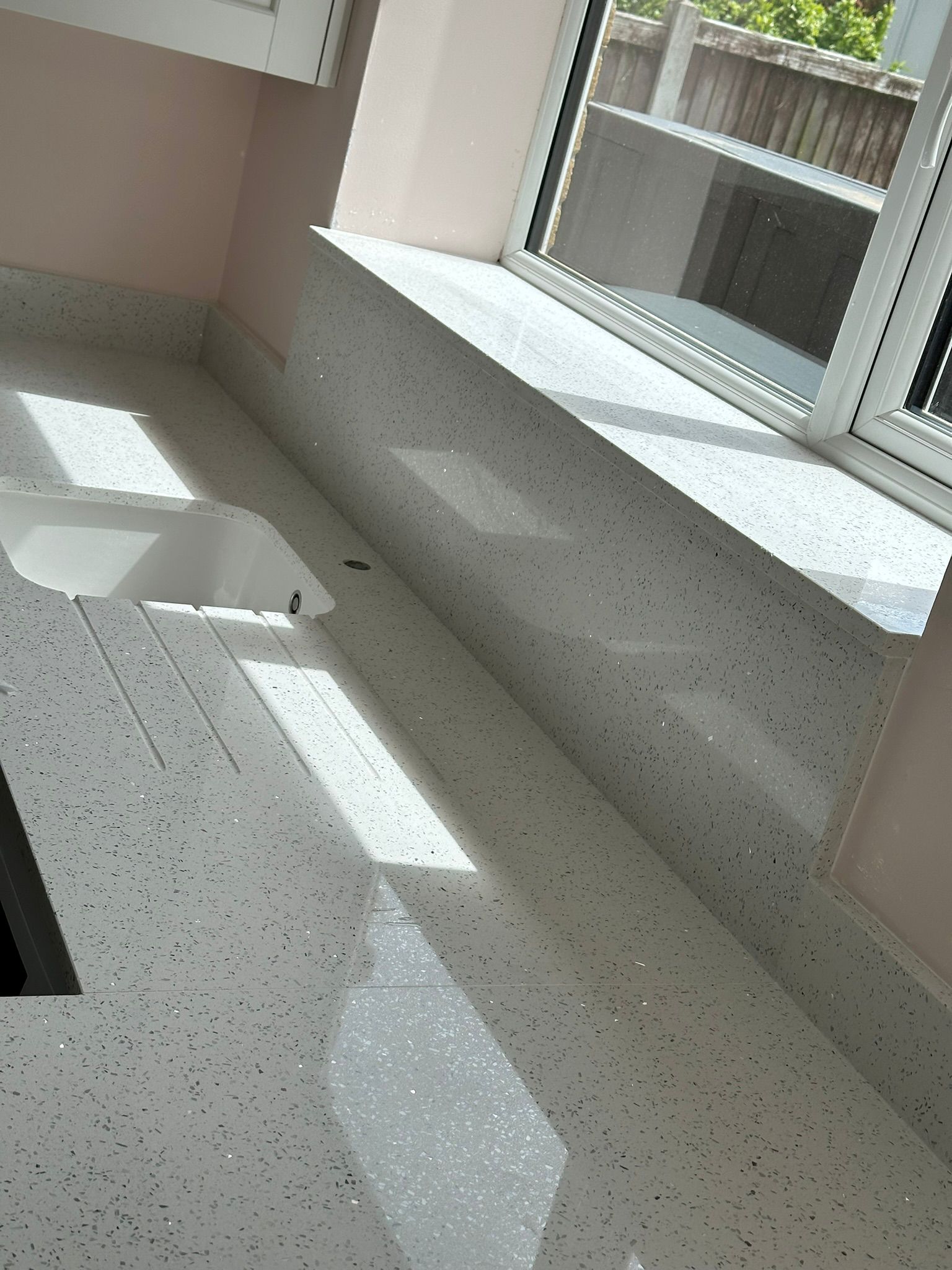 Sparkle terrazzo-style quartz worktop in sunlight